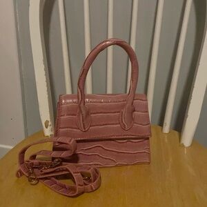 Pink faux leather mini purse with additional strap